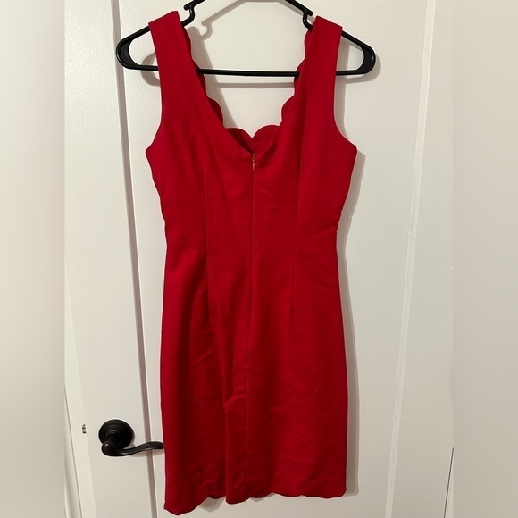 Red dress! Mid length and lined stretchy material! - Picture 2 of 4
